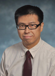 Dr. OI-MAN KWOK